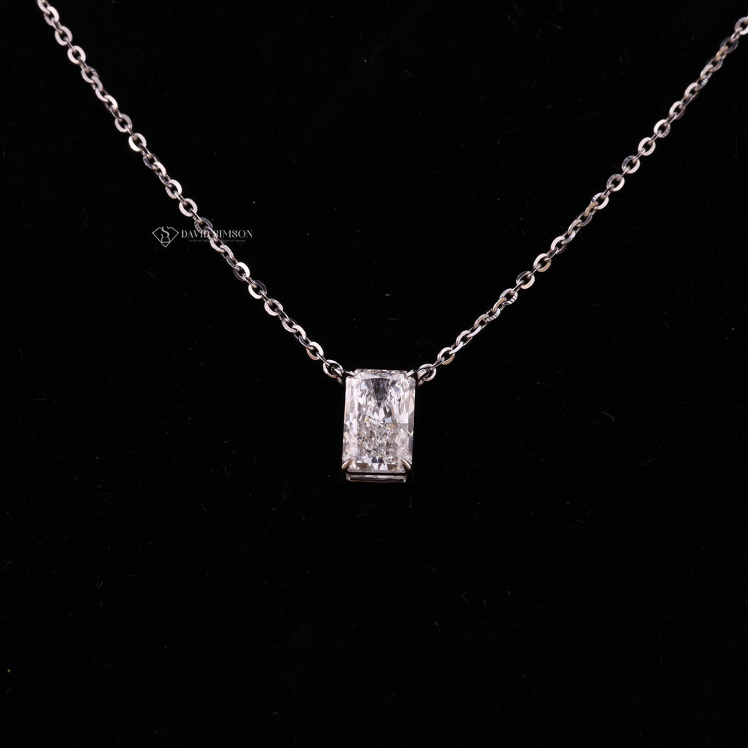 Hidden Halo Radiant Cut
Bezel Set Moissanite
VVS1 Moissanite Clarity
Colorless D-E Moissanite
14k Gold Moissanite Pendant
925 Sterling Silver Necklace