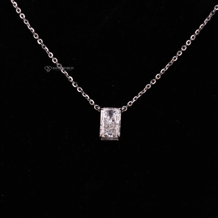 Hidden Halo Radiant Cut
Bezel Set Moissanite
VVS1 Moissanite Clarity
Colorless D-E Moissanite
14k Gold Moissanite Pendant
925 Sterling Silver Necklace