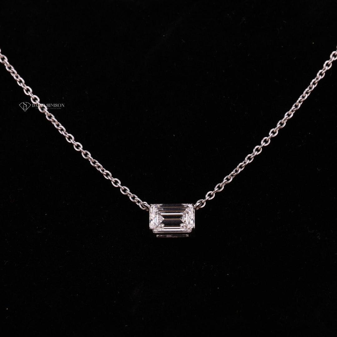 Minimalist Solitaire
Dainty Emerald Necklace
Modern East West Setting
Bezel Set Emerald
Emerald Cut Solitaire
14k Gold Emerald Pendant