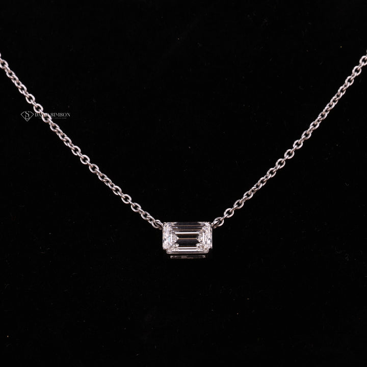 Minimalist Solitaire
Dainty Emerald Necklace
Modern East West Setting
Bezel Set Emerald
Emerald Cut Solitaire
14k Gold Emerald Pendant