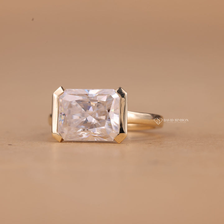 Sleek East West Solitaire
Sustainable Radiant Ring
Conflict Free Moissanite
Ethical Engagement Ring
Handcrafted Bezel Ring
Sparkling Radiant Band

