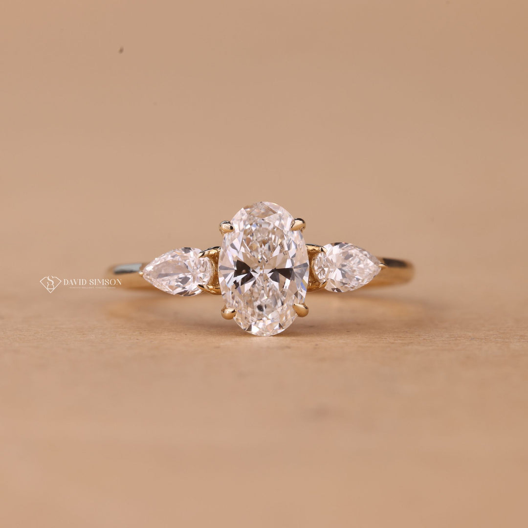 Elegant Oval Solitaire
Oval Moissanite Jewelry
Round Side Stone Ring
