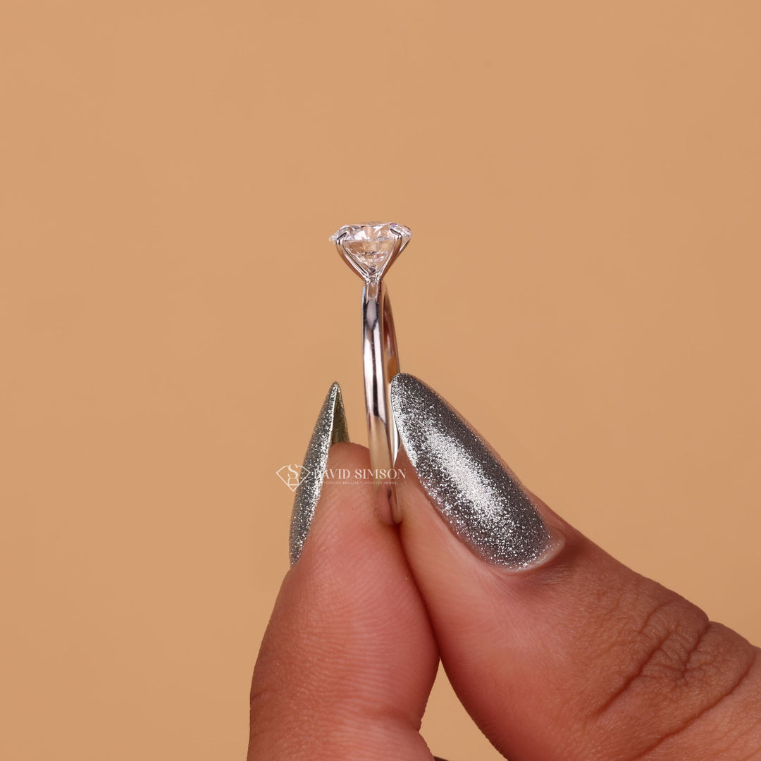 Ethical moissanite diamond ring
Sustainable diamond engagement ring
Round cut solitaire diamond ring