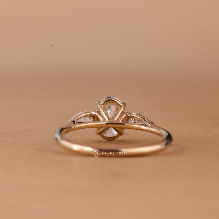Oval Cut Diamond Ring
Eco Friendly Moissanite
Elegant Oval Solitaire
Oval Moissanite Jewelry
Round Side Stone Ring
