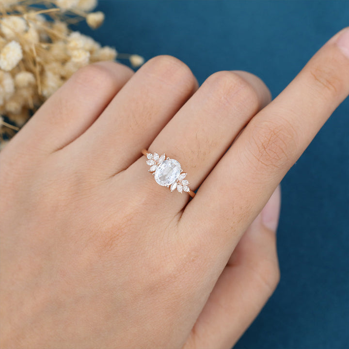 oval-shaped-moissanite-cluster-engagement-ring-18