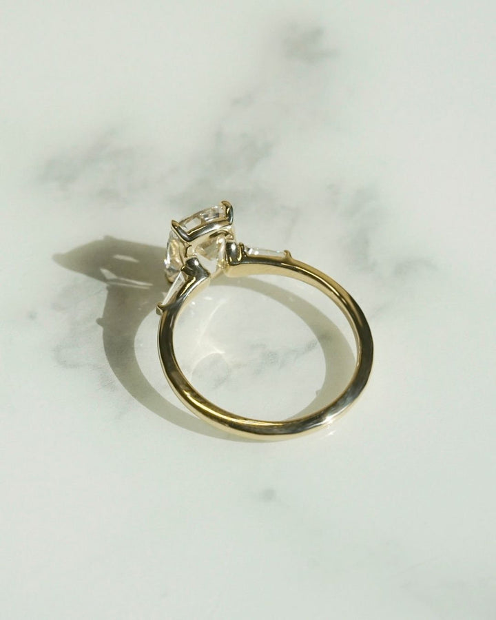 Lab Grown Moissanite
Victorian Style Ring
Sustainable Engagement
Large Cushion Moissanite
Gold Three Stone Ring
Platinum Cushion Setting
Heirloom Style Jewelry
