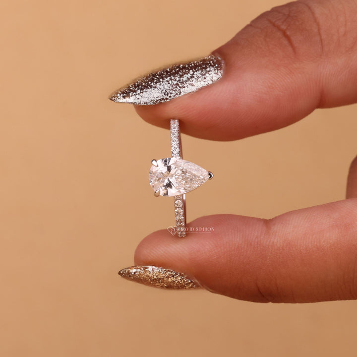 14K Gold Pear Moissanite
Ethical Engagement Ring
Moissanite Teardrop Ring
