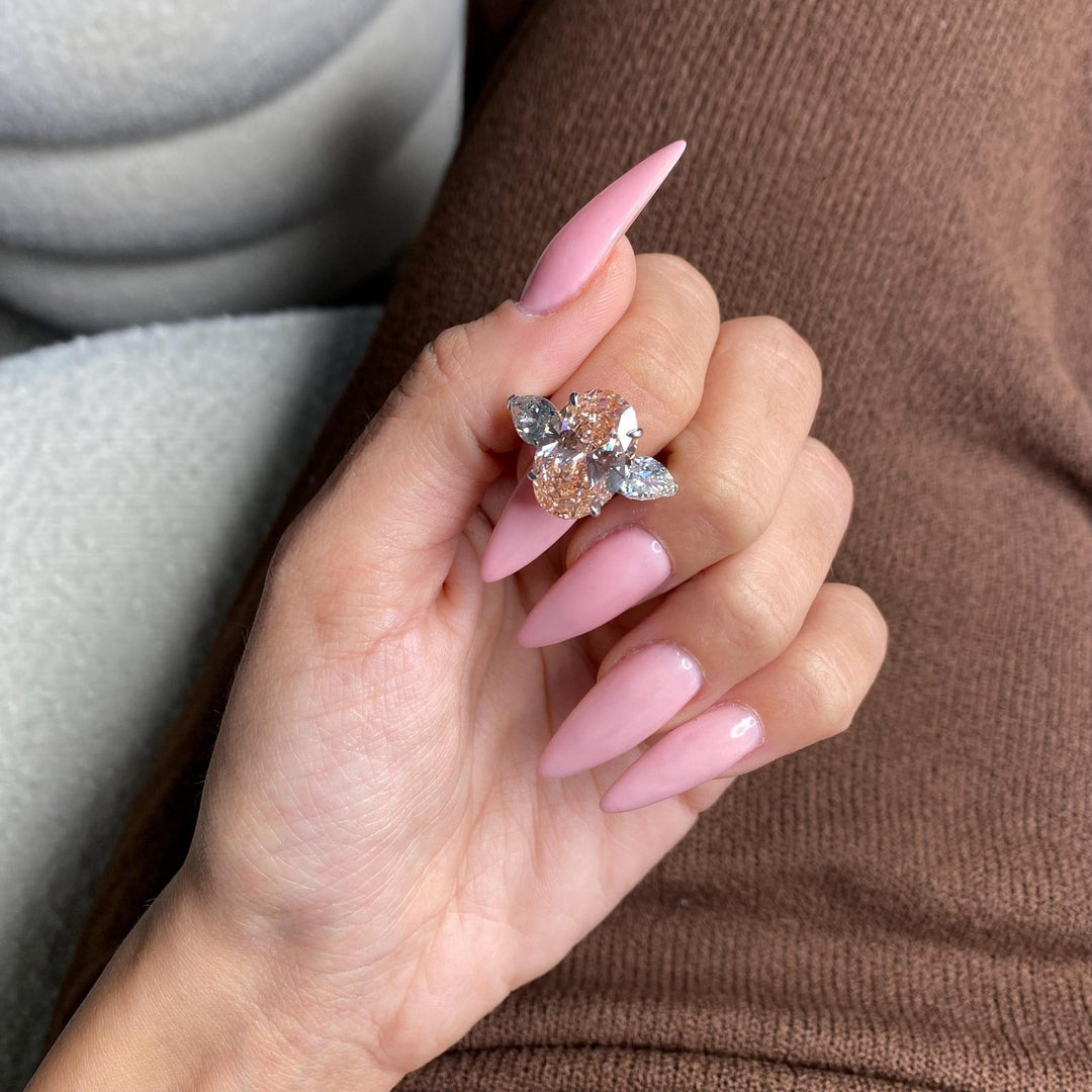 Peach Moissanite Ring
Oval Cut Moissanite
Three Stone Engagement Ring
3CT Peach Moissanite
