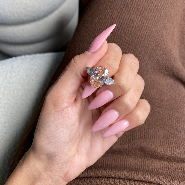 Peach Moissanite Ring
Oval Cut Moissanite
Three Stone Engagement Ring
3CT Peach Moissanite
