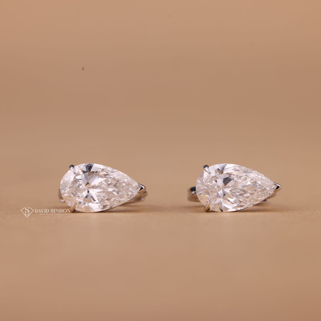 Pear Cut Moissanite Hoops
Moissanite Diamond Hoop Earrings
Pear Shaped Drop Hoop