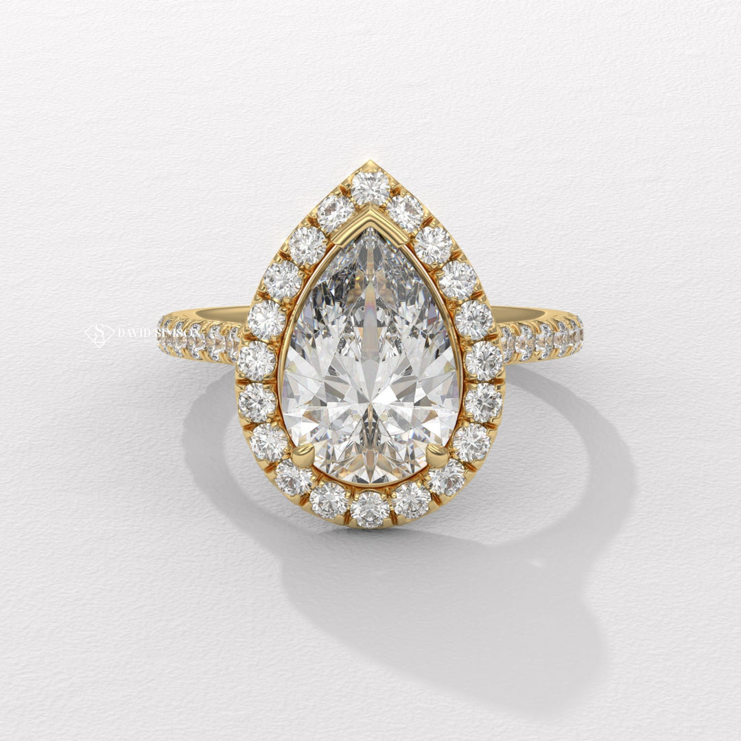 Pear pave diamond ring, Pear vintage diamond ring, Pear classic diamond ring, Pear modern diamond ring, Pear three-stone diamond ring, Pear side stone diamond ring, Pear cathedral diamond ring, Pear bezel diamond ring, Pear tension set diamond ring, 
