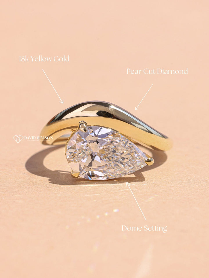 Pear glamorous diamond ring, Pear sophisticated diamond ring, Pear trendy diamond ring, Pear fashionable diamond ring, Pear versatile diamond ring, Pear ethical diamond ring, Pear sustainable diamond ring, Pear conflict-free diamond ring, 