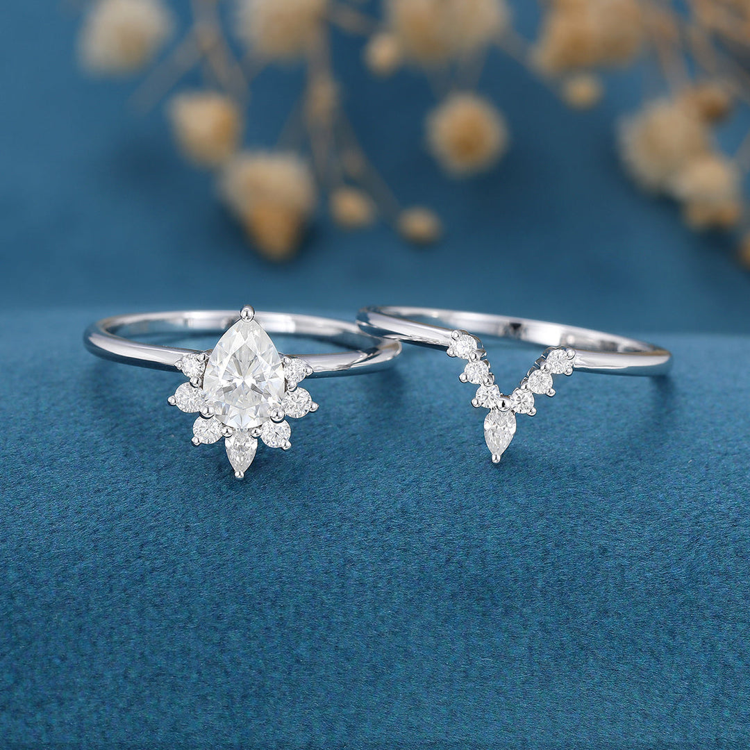 0-69-ct-pear-shaped-moissanite-halo-nature-inspired-bridal-set