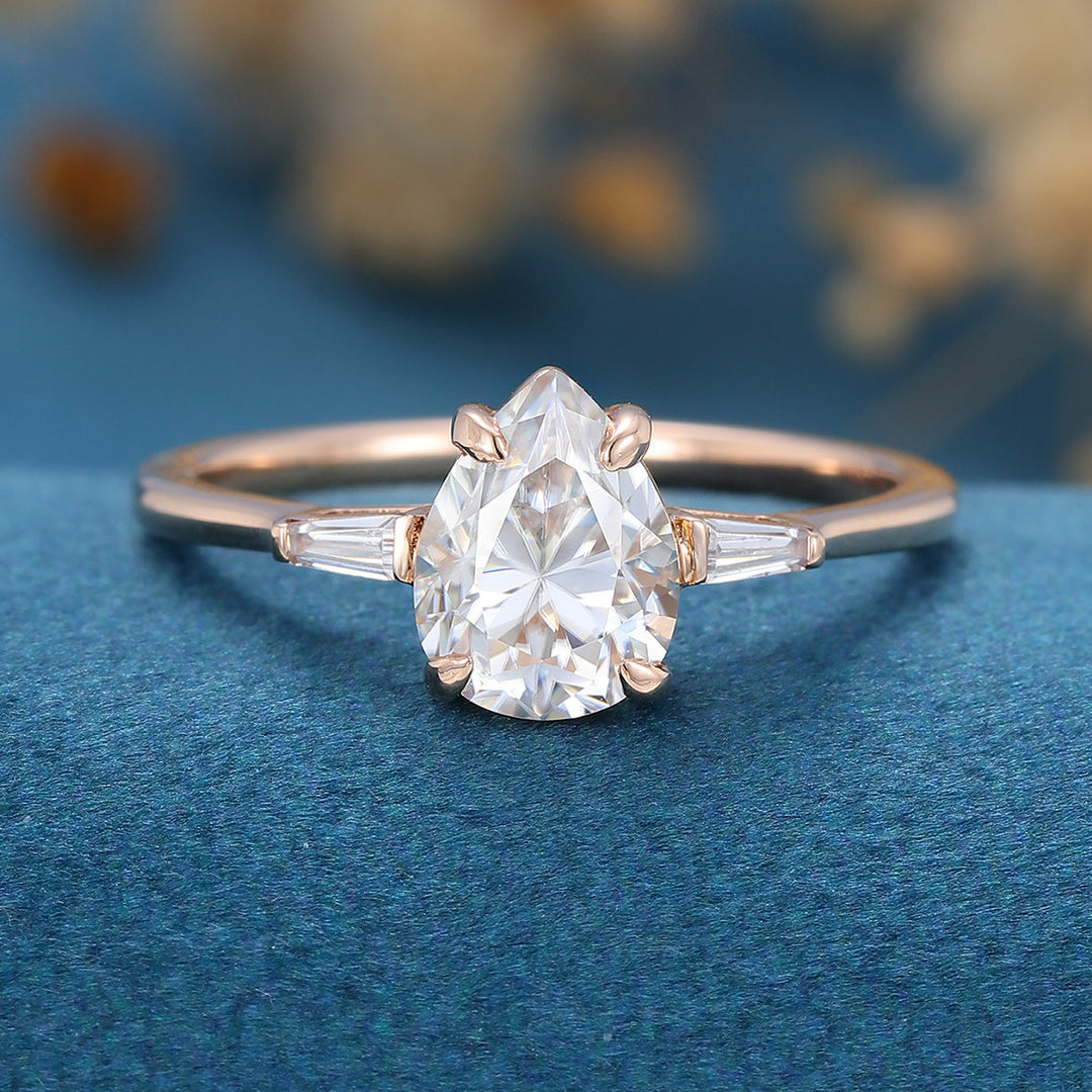 1-0-ct-pear-shaped-moissanite-three-stones-engagement-ring