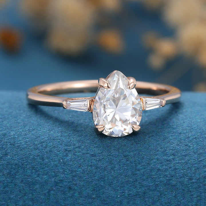 1-0-ct-pear-shaped-moissanite-three-stones-engagement-ring