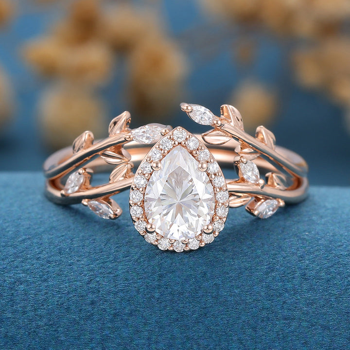 pear-shaped-moissanite-halo-nature-inspired-bridal-set