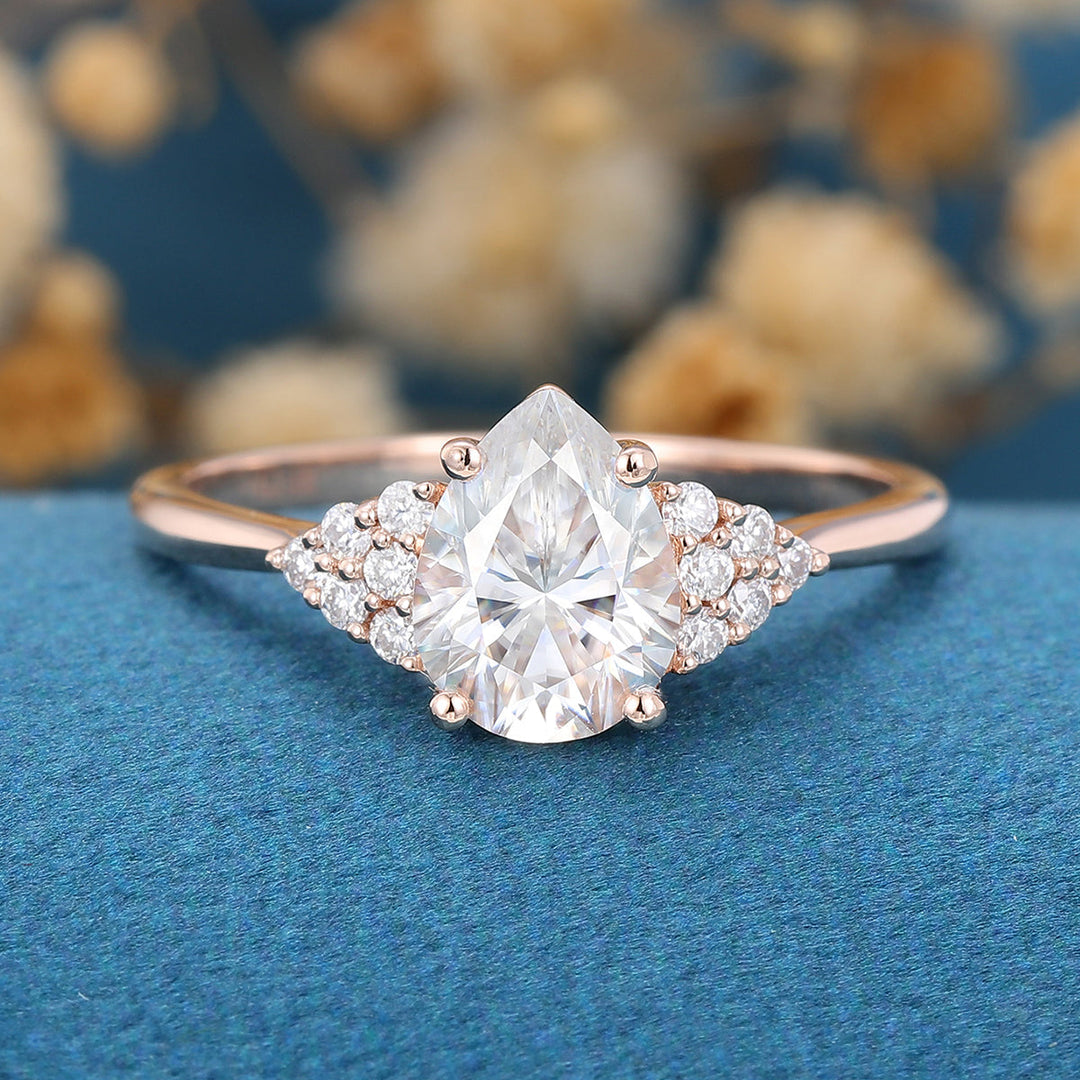 1-0-ct-pear-shaped-moissanite-cluster-engagement-ring-16