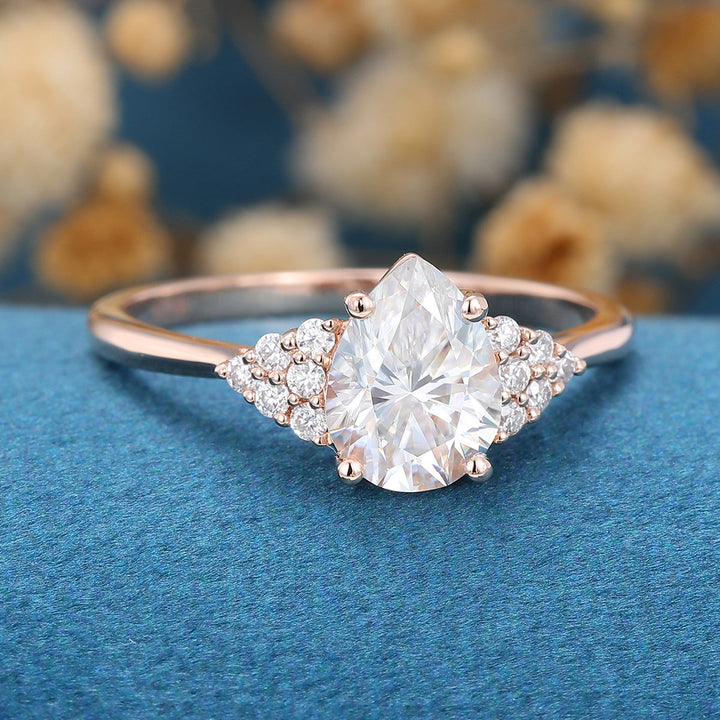 1-0-ct-pear-shaped-moissanite-cluster-engagement-ring-18