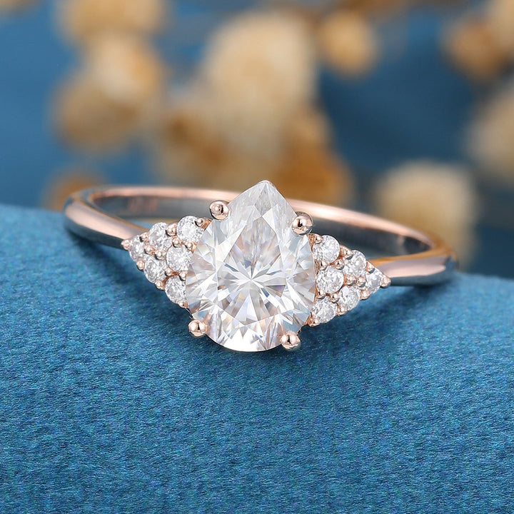 pear-shaped-moissanite-cluster-engagement-ring-17