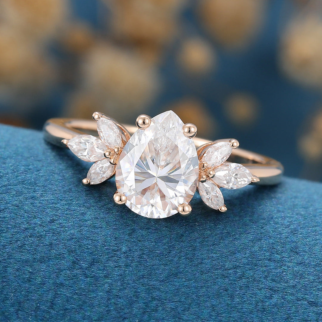 1-0-ct-pear-shaped-moissanite-cluster-engagement-ring-18