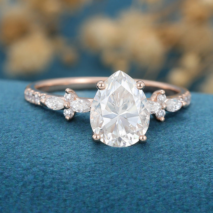 1-0-ct-pear-shaped-moissanite-solitaire-pave-engagement-ring