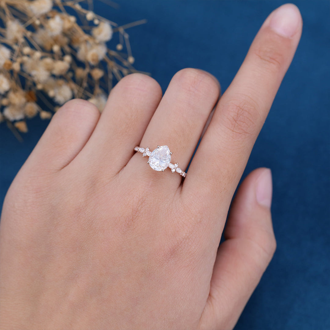 pear-shaped-moissanite-solitaire-pave-engagement-ring