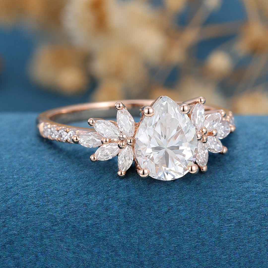 1-0-ct-pear-shaped-moissanite-cluster-engagement-ring-13