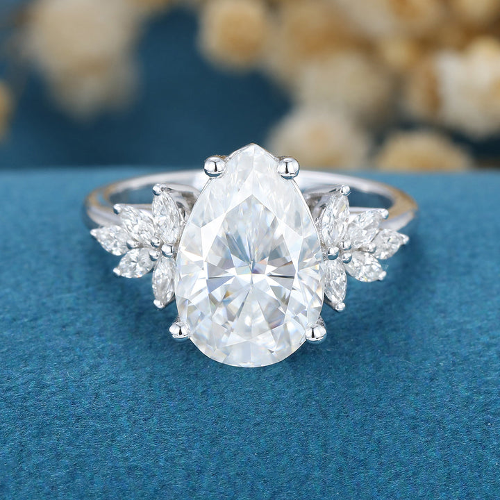 3-09-ct-pear-shaped-moissanite-cluster-engagement-ring