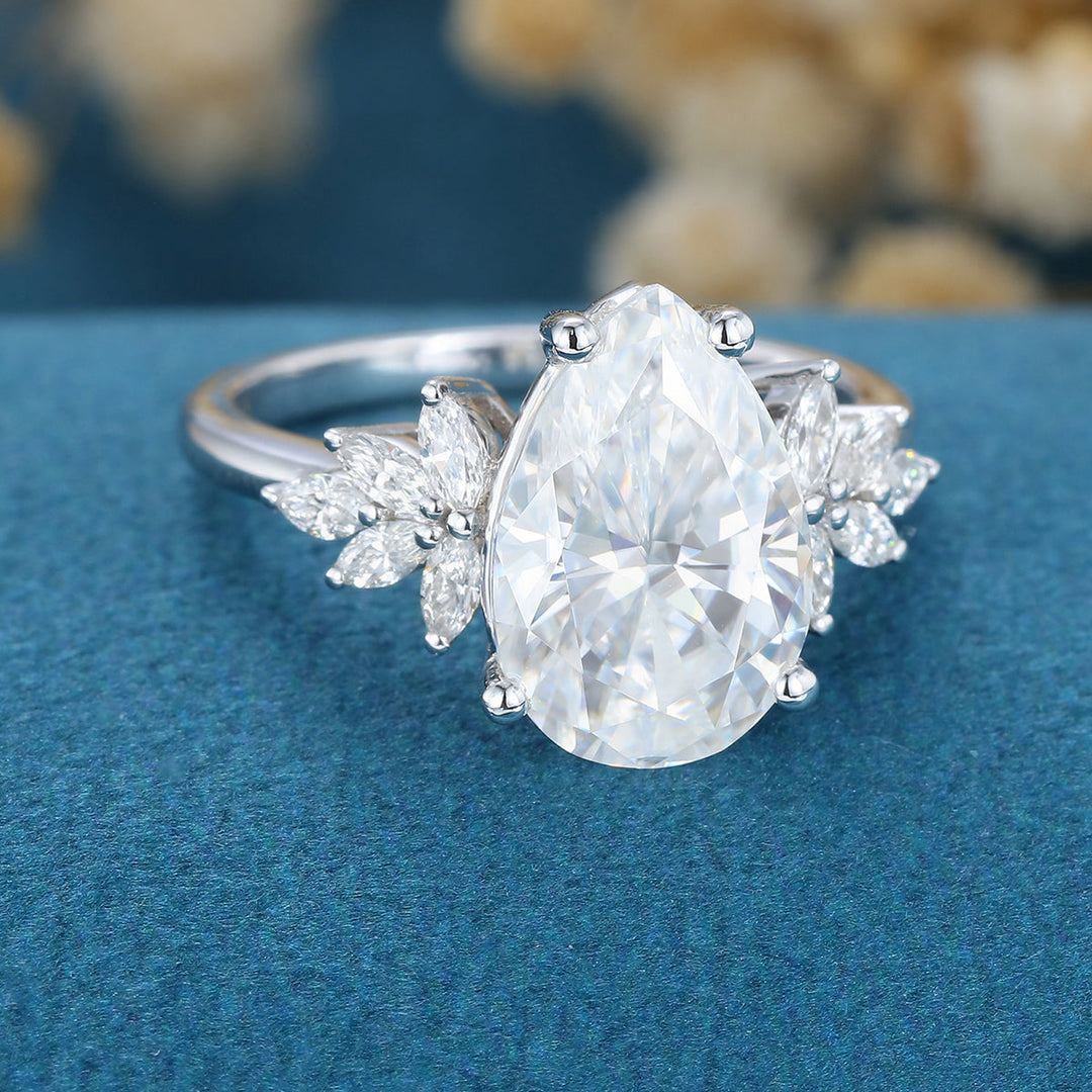 3-09-ct-pear-shaped-moissanite-cluster-engagement-ring