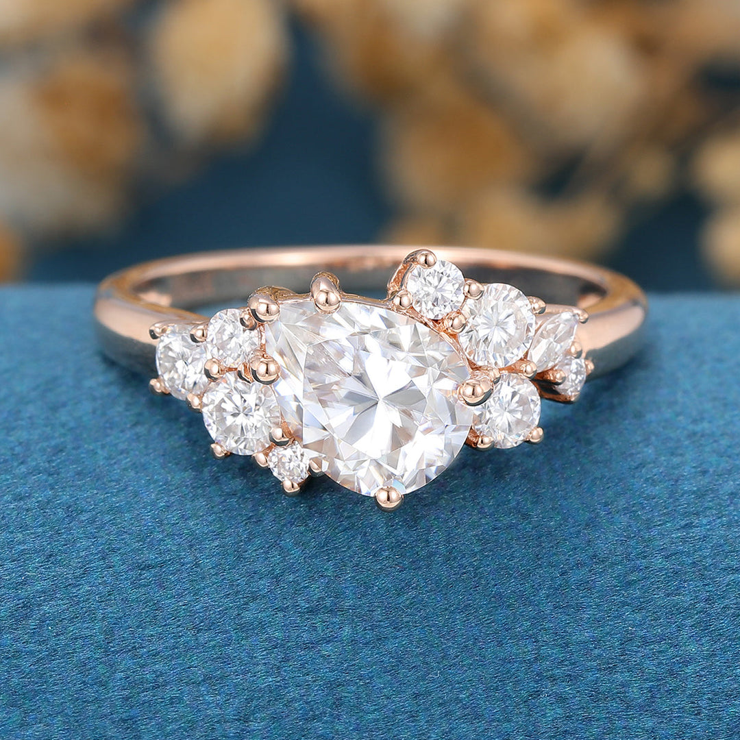 1-0-ct-pear-shaped-moissanite-cluster-engagement-ring-15