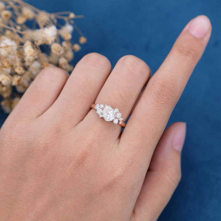 pear-shaped-moissanite-cluster-engagement-ring-16