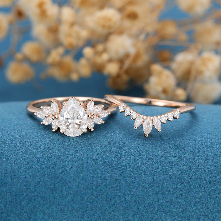 1-0-ct-pear-shaped-moissanite-cluster-bridal-set-2