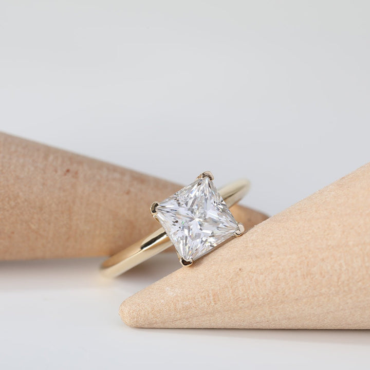Geometric Engagement Ring Aesthetic26. 4ct Princess Diamond Wedding Jewelry27. Clean Lines Diamond Ring Design28. Princess Cut Hidden Halo Solitaire