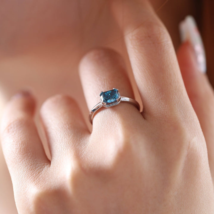 Starlit Ocean Ring
Fancy Color Diamond Ring
Blue Radiant Solitaire
Teal Blue Diamond
Unique Blue Engagement Ring
Sustainable Blue Diamond
Ethical Bridal Jewelry
