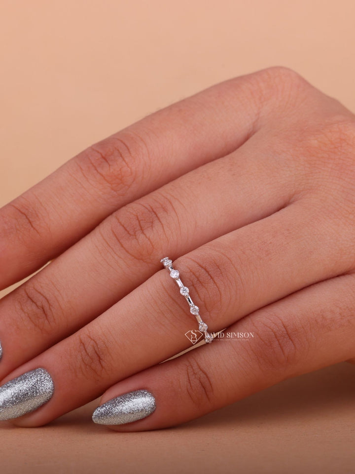 Round Cut Moissanite Diamond Distance Pave Wedding Band