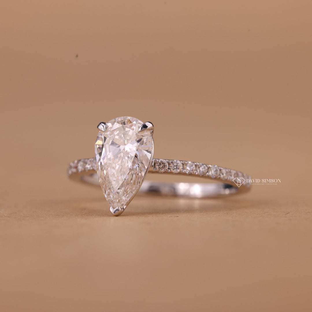 Vintage Pear Cut Ring
Dainty Pave Moissanite
Conflict Free Engagement Ring
Pear Cut Promise Ring
