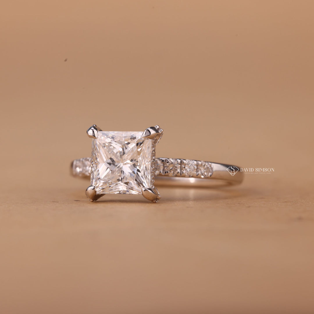 Solid gold bridal ring
GRA certified moissanite
Princess solitaire pave