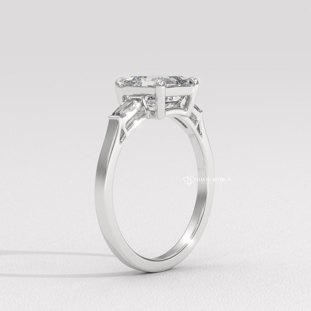 Statement Engagement Ring
Emerald Cut Alternative
Step Cut Moissanite
Side Stone Engagement Ring