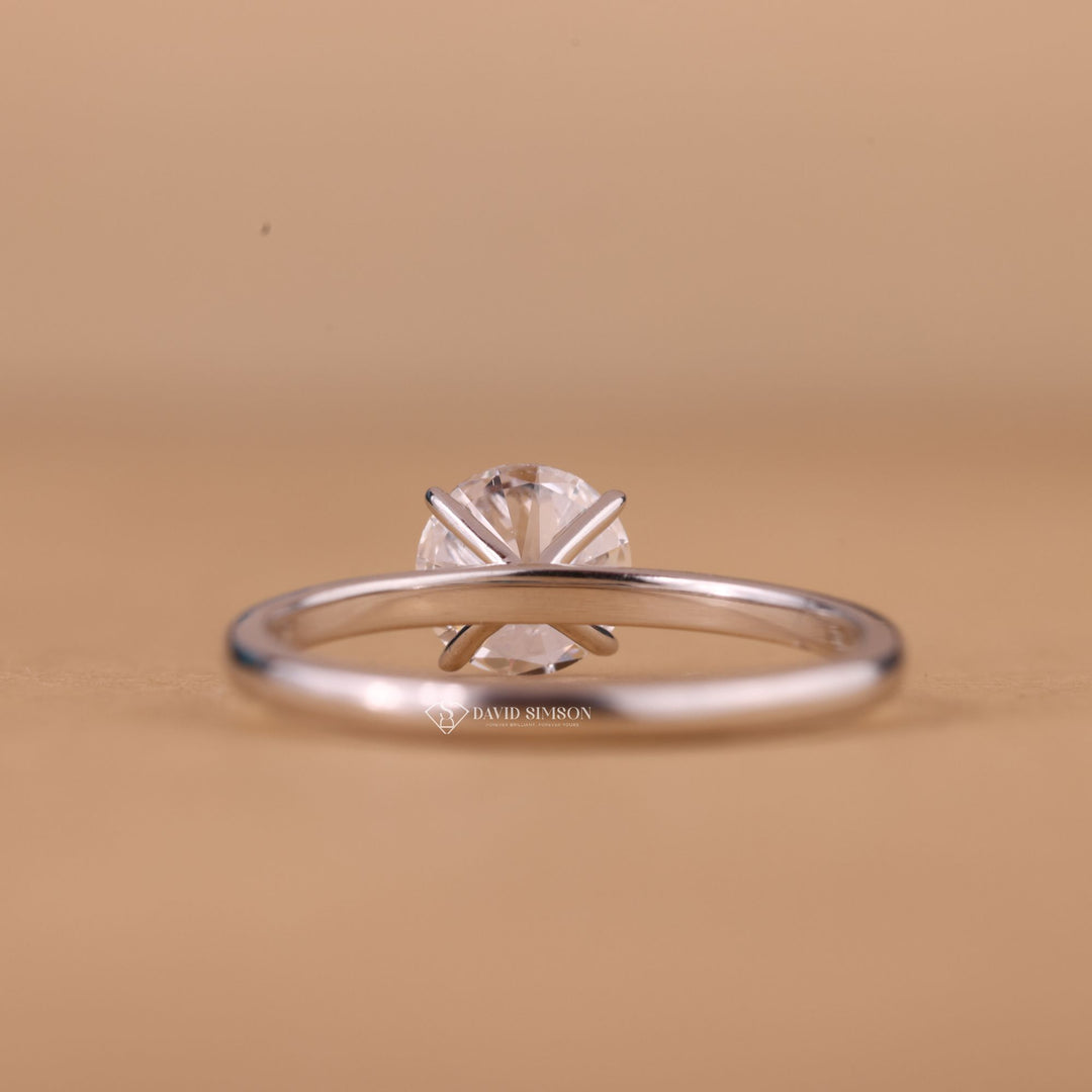 Round cut moissanite wedding ring
Simple solitaire engagement ring
Luxury moissanite diamond ring
Unique round cut moissanite ring