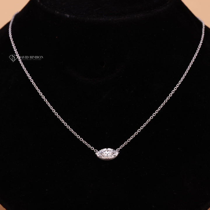 14k Gold Marquise Pendant
Solid Gold Necklace
Sleek Diamond Choker
Unique Solitaire Setting
Marquise Cut Brilliance
