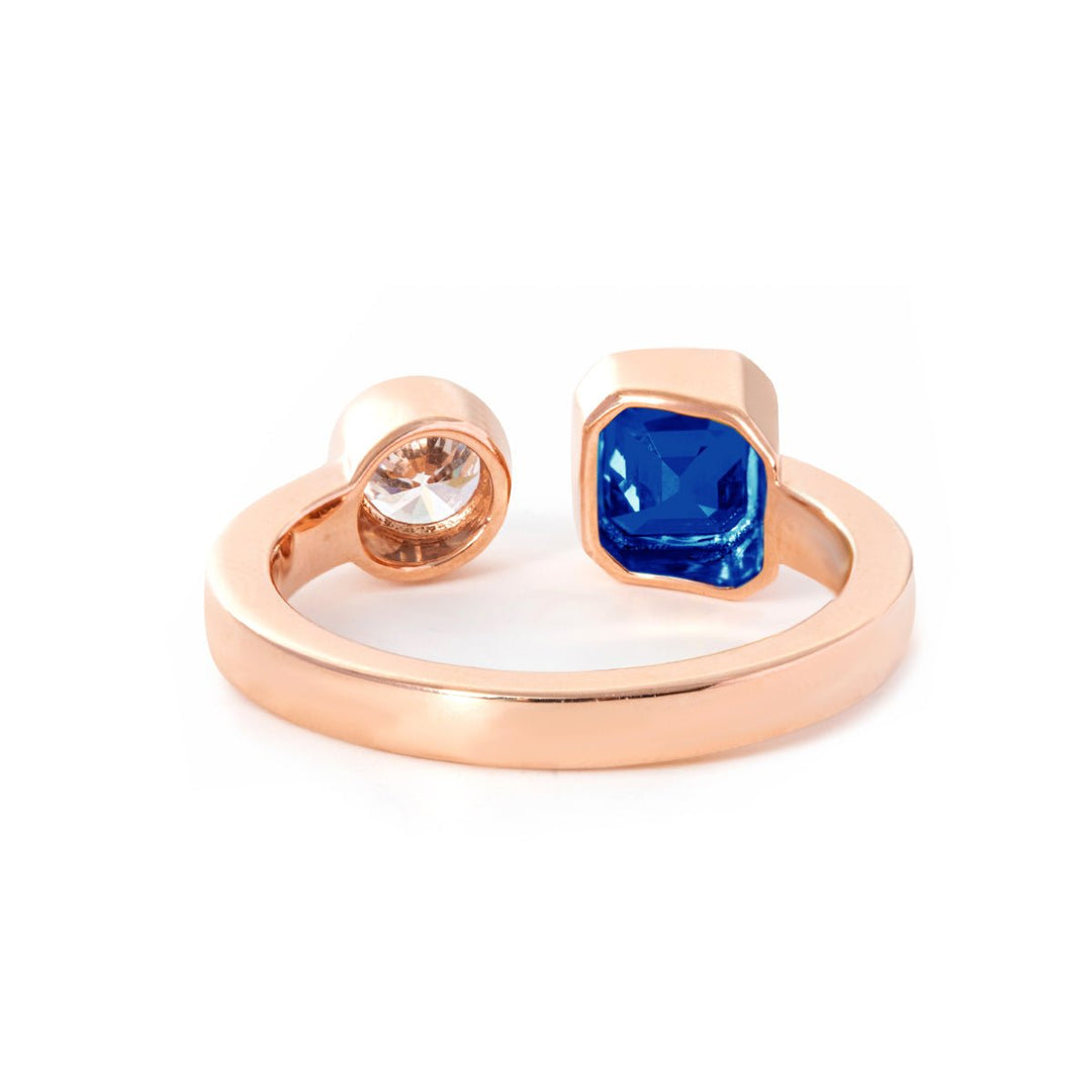Two Stone Emerald and Round Ring
