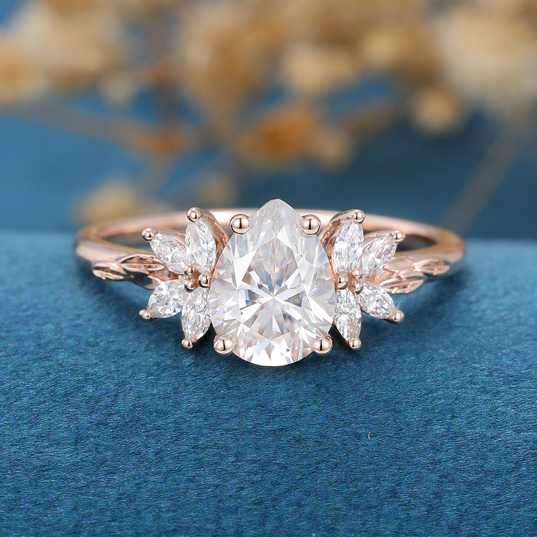 1-0-ct-pear-shape-moissanite-cluster-engagement-ring