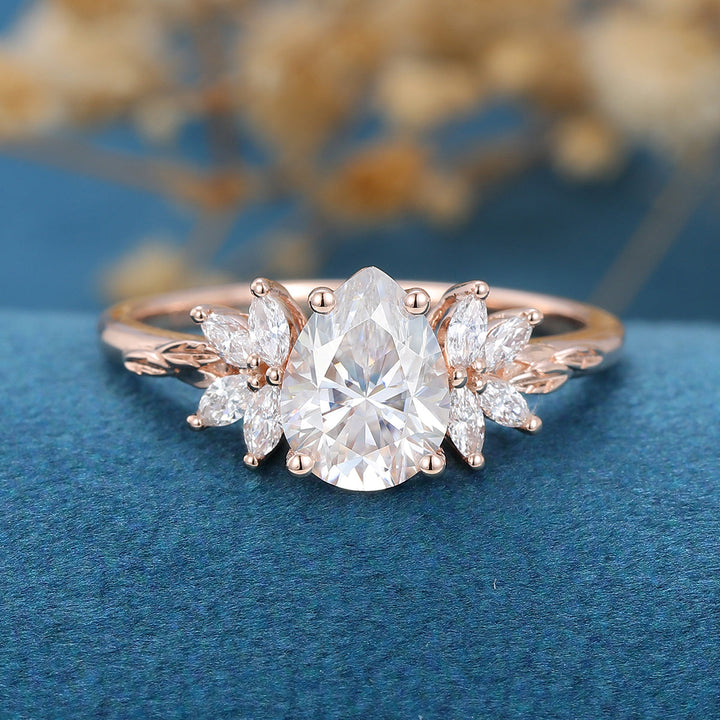 1-0-ct-pear-shape-moissanite-cluster-engagement-ring