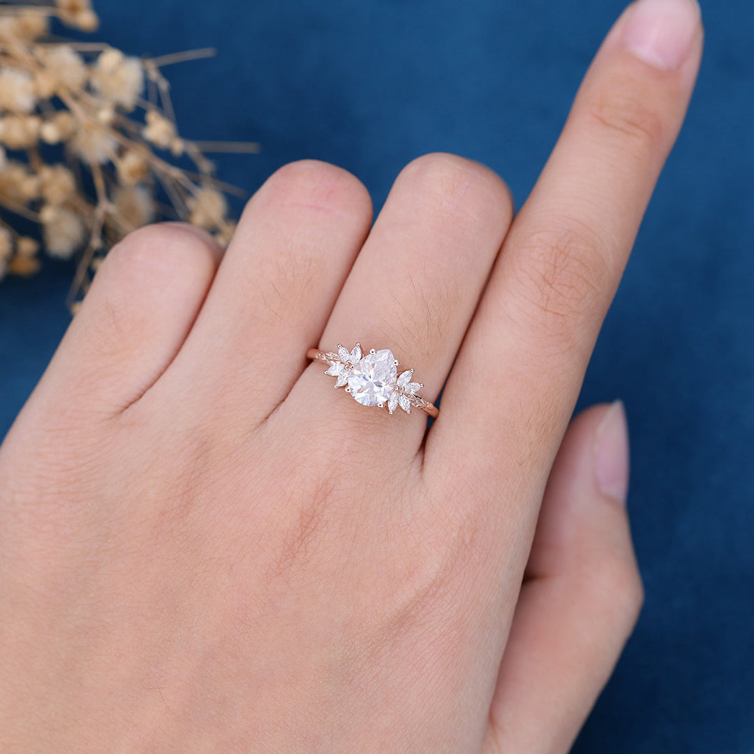 pear-shape-moissanite-cluster-engagement-ring