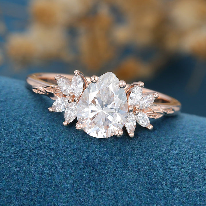 pear-shape-moissanite-cluster-engagement-ring