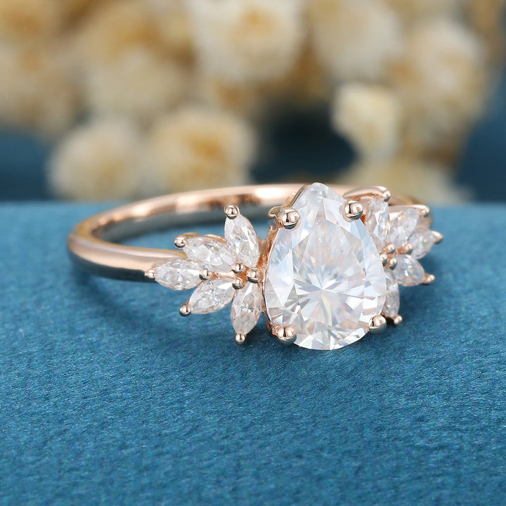 1-0-ct-pear-shaped-moissanite-cluster-engagement-ring-14