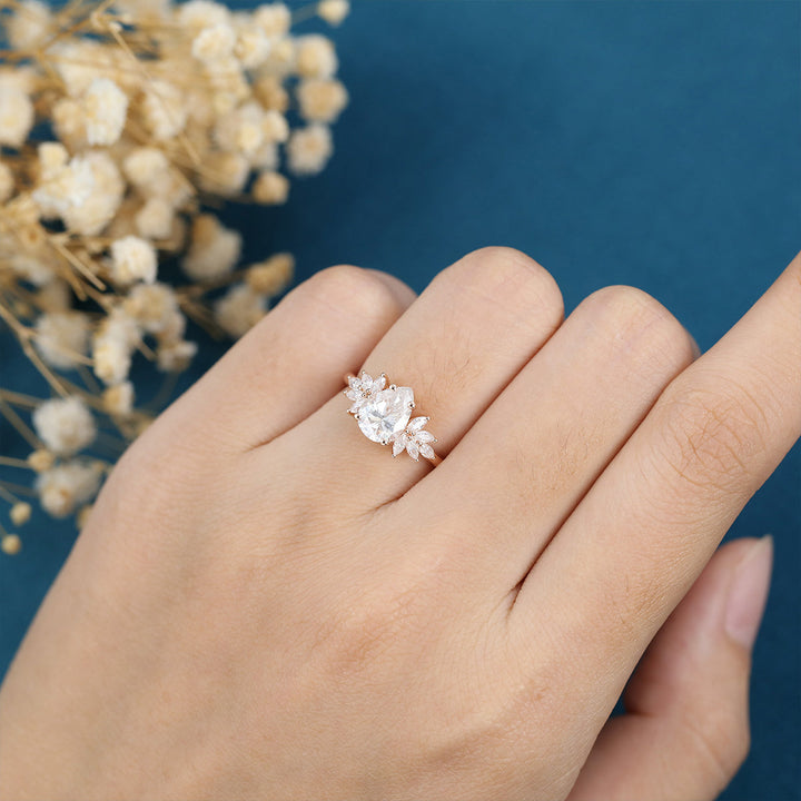 pear-shaped-moissanite-cluster-engagement-ring-13