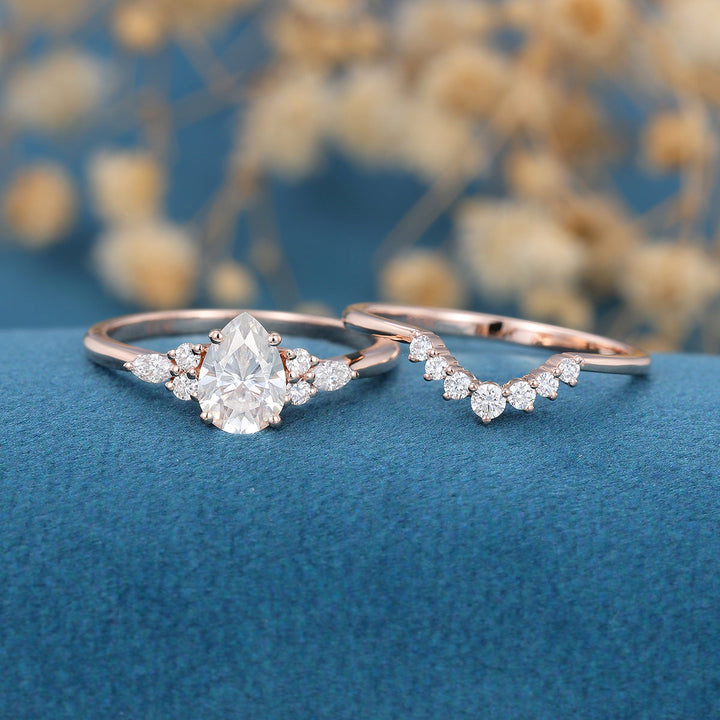 1-0-ct-pear-shaped-moissanite-cluster-bridal-set-5