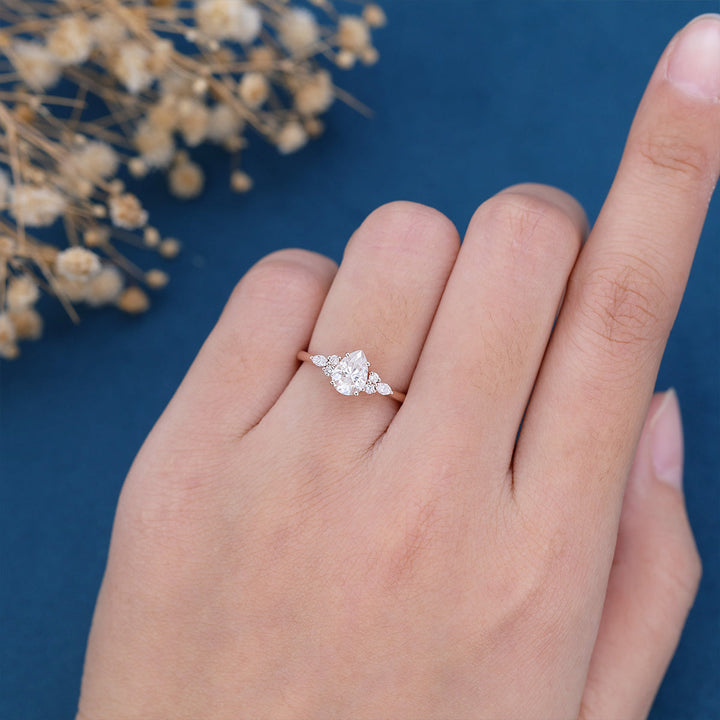 pear-shaped-moissanite-cluster-engagement-ring-18