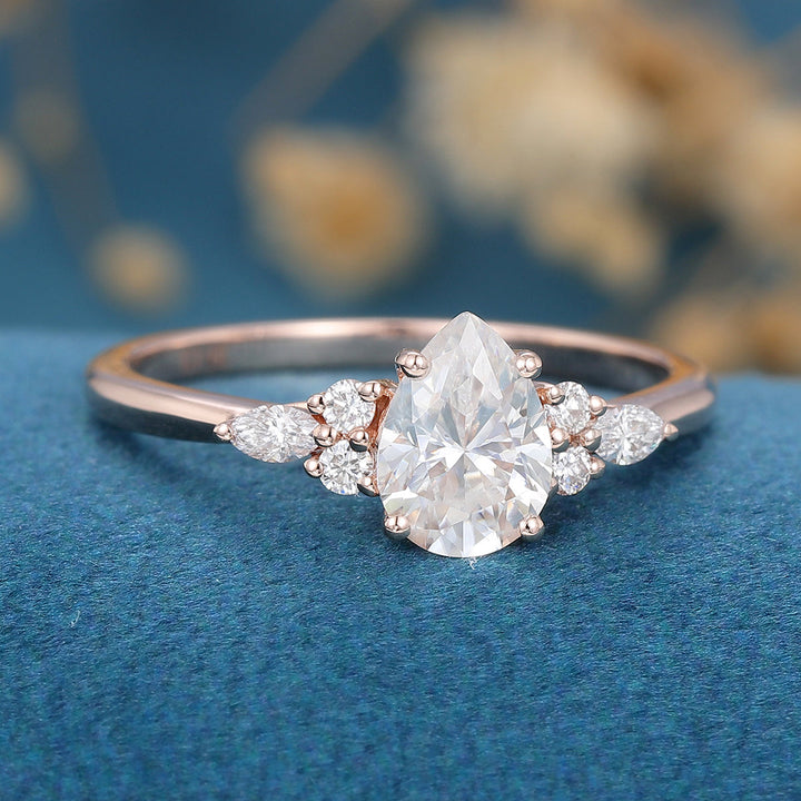 pear-shaped-moissanite-cluster-engagement-ring-18